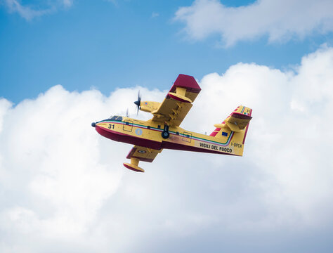 Ponferrada, Leon, Spain; 08-20-2025: An Italian CL-415 seaplane (fire department) heads toward a fire after collecting water from the B&aacute;rcena reservoir during the 2025 fires