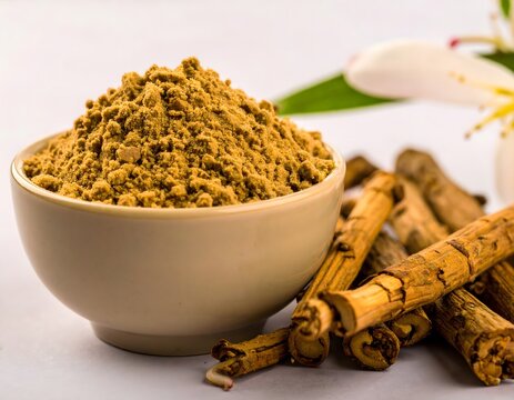 Vasambu Powder in a Ceramic Bowl with Root Sticks