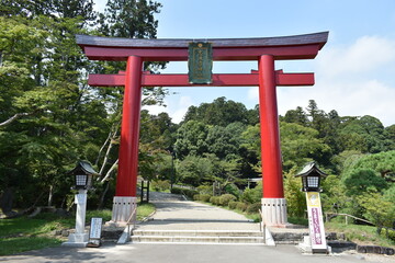 Red Torii Gate at Shrine Entrance in Japan