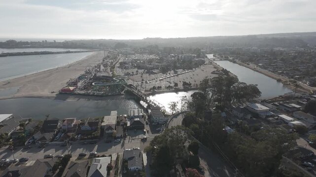 RAW LOG Aerial&mdash;Santa Cruz Beach Boardwalk, San Lorenzo River & Railroad Trestle at River Mouth with Parking Lots and Coastal Skyline at Golden Hour (California, USA)