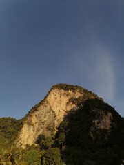 Limestone mountain against the background of a blue sky