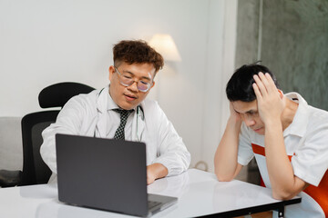 Doctor consulting with patient in office, highlighting medical advice and emotional distress due to...