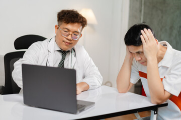 Doctor Consults with Patient in Office, Discussing Health Issues and Possible Solutions,...