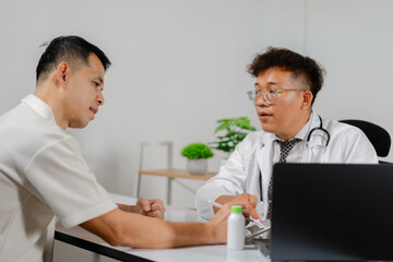 Fototapeta premium Professional doctor consulting with patient in modern clinic, discussing health issues and treatments in comfortable office setting, close-up view