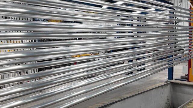 Aluminum profiles in industrial factory. Heavy industry