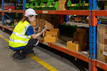young teen women warehouse worker in warehouse cargo logistics shipping supply chain industry