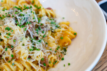 Pasta with mushrooms and veal with cheese