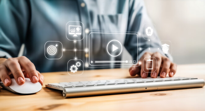 Person using a computer with a digital interface showing various icons related to business, technology, and online content creation, symbolizing digital transformation and workflow management
