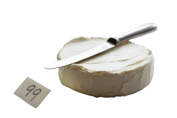 Round of cream cheese with knife and tag with number 99