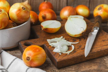 Onion on the kitchen table. onion slice. onion rings. Fresh Yellow Onion. Natural, fresh, vegetarian food. Agricultural products. Healthy eating. Vegetables. Farmer's market. Space for text.Copy space