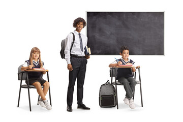 African american male student with young schoolkids in a classroom
