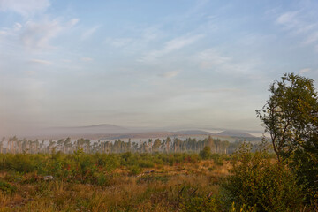 Obraz premium Looking towards the Angus Glens from the hills above above Brechin, with low morning mist carpeting the Valley Floor,