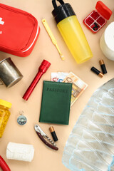 Necessities for emergency bag on beige background
