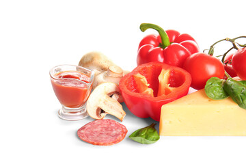Fresh ingredients for preparing pizza on white background