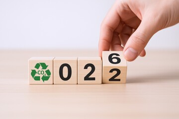 Symbolic Transition from 2022 to 2026 with Environmental Focus Blocks, Signifying Growth and Future Sustainability