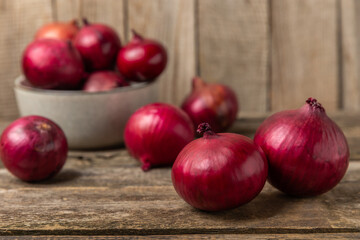 Shallot onion on the kitchen table. onion slice. onion rings. Fresh red Onion. Natural, fresh, vegetarian food. Agricultural products. Healthy eating. Vegetables. Farmer's market.
