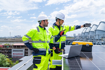 Technicians inspecting industrial cooling fans outdoors © Washburn