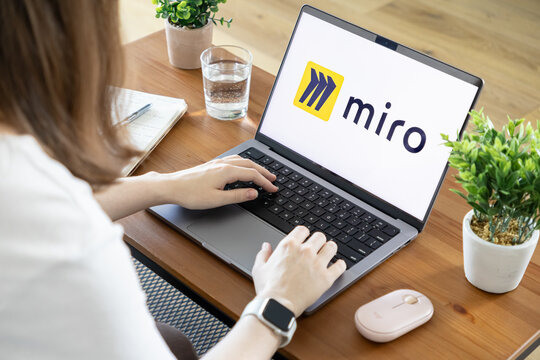 Poznan, Poland - August 23, 2025: Miro application visually presented on a laptop screen, a person actively types, enabling seamless digital collaboration and flexible remote work