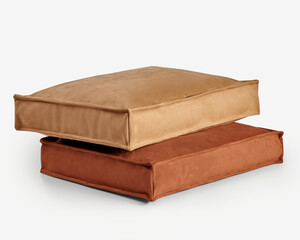 Two comfortable pet beds resting on white background