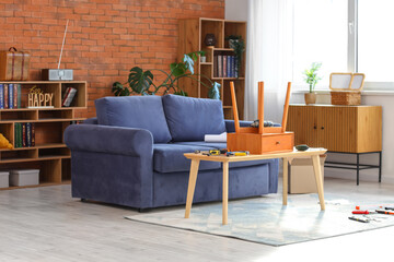 Assembled table with tools in living room