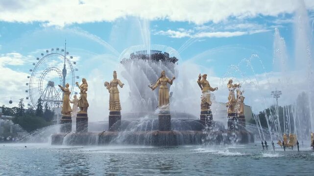 Golden statues representing former Soviet republics around the Friendship of Peoples fountain at VDNH, a powerful symbol of unity and historical legacy.