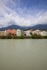 Fototapeta premium Colorful houses on the bank of the Inn river, Innsbruck, Austria