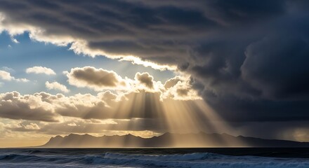 Dramatic sunlight rays breaking through dark storm clouds over the ocean