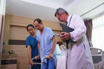 A doctor or nurse is caring for a patient with respiratory problems. A portable oxygen concentrator or other type of oxygen generator.