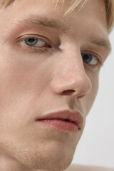 Extreme close up male face with skin texture detail. Concept of dermatology, cosmetic campaign, wellness platform, beauty editorial, packaging design, and skincare education for men.