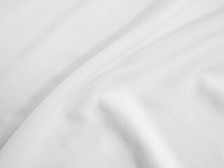 White crumpled fabric background. Wavy cloth texture