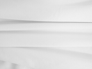White crumpled fabric background. Wavy cloth texture