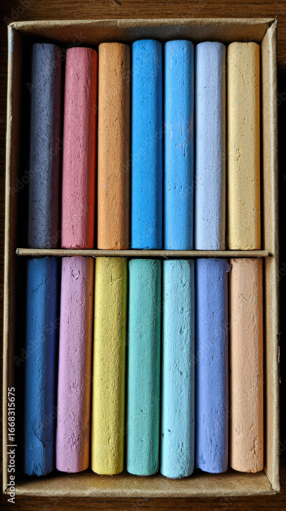 Aufkleber colorful pastel chalk sticks arranged in box create vibrant and artistic display. assortment include