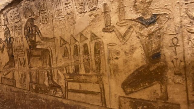 Walls of Abu Simbel Temple with Ramesses II making offerings