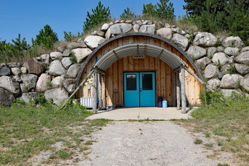 The Leelanau Cheese Store in Suttons Bay, MI, has it's own cheese cellar, like a wine cellar.  They make their own cheese.  2,000 wheels of cheese ageing.