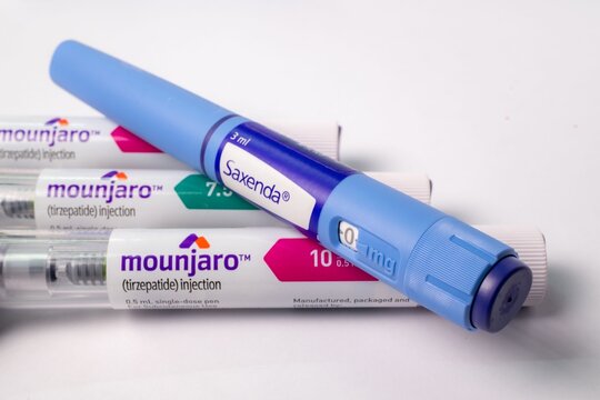 Diabetes medication injection pens close-up.