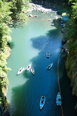 A view of people on the boat.    Takachiho, Miyazaki, Japan
