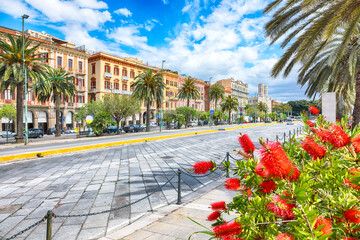 Street with typical architecture of the old center of Cagliari and Town Hall, Municipio di Cagliari.