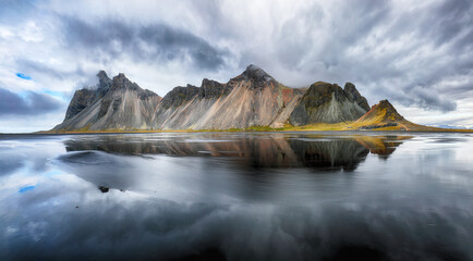 Amazing nasty day and dramatic black sand beach on Stokksnes cape in Iceland