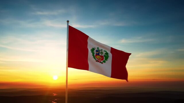 Peruvian flag waves at sunset. Patriotic scene shows colors of Peru