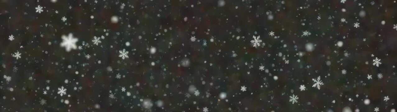 Snowflakes falling on colorful abstract background, creating winter wonderland atmosphere.
