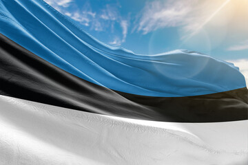 A vivid collection of national flags fluttering under the sunlit sky, representing the colors and pride of diverse nations around the world.