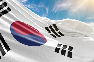 A collection of waving national flags under the blue sky, symbolizing unity, pride, and international identity