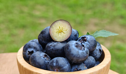 Fresh Blueberry in a wooden cup