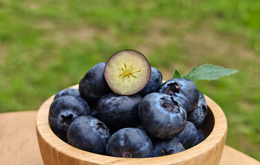 Fresh Blueberry in a wooden cup