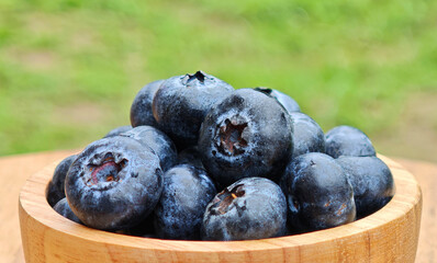 Fresh Blueberry in a wooden cup