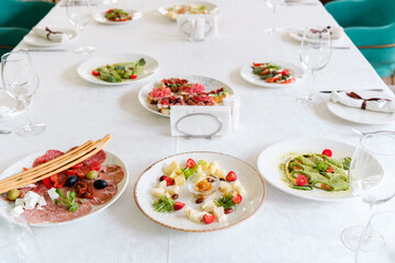 Elegant dining setup featuring a variety of gourmet dishes at a table