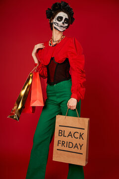 Woman celebrates diade los muertos with unique fashion and colors during a festive shopping day
