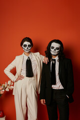 Couple honours Life and Death Through Traditional Sugar Skull Makeup on Dia de los Muertos