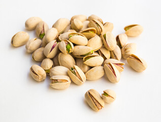 roasted pistachios on white background