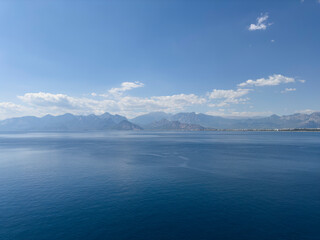 deep blue sea and beautiful distant mountains